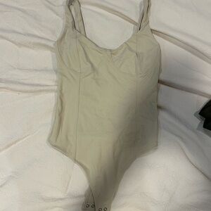 Abercrombie & Fitch Cream One-Piece Bodysuit